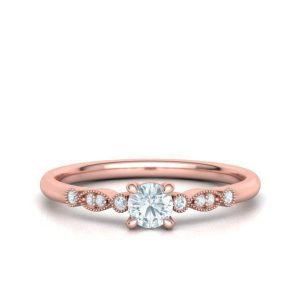monopetro-thachtelithi-roz-chreso-k18-vintage-me-thiamanti-0-22ct-kai-petres-sto-plai-2000
