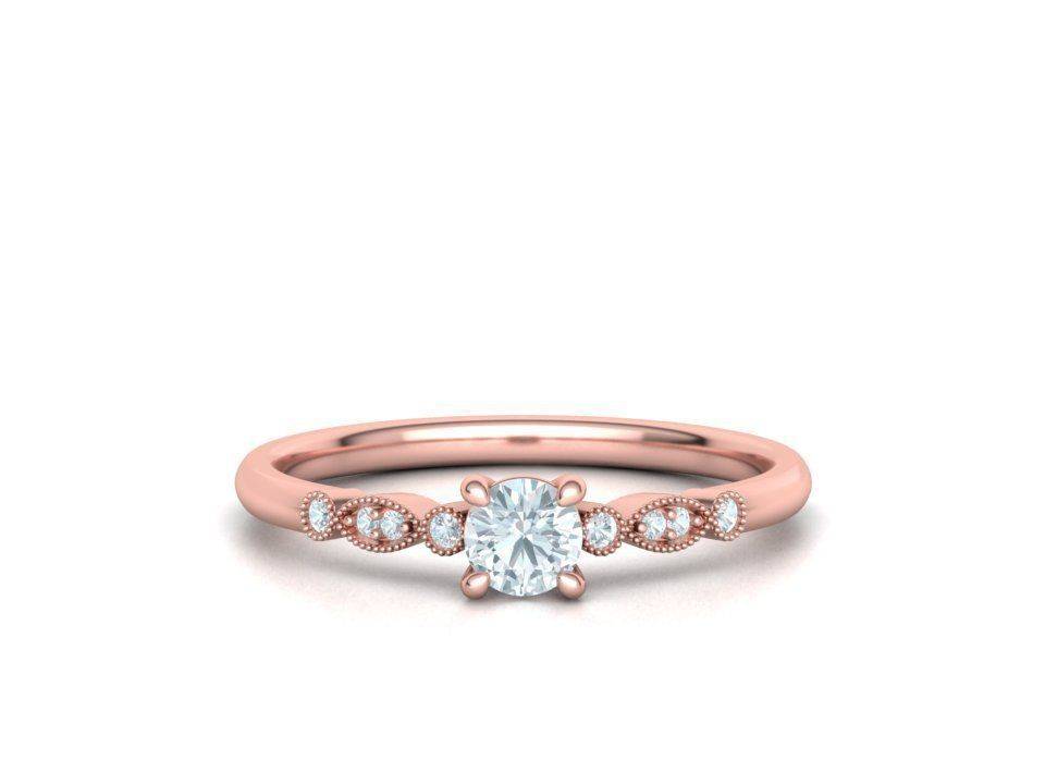 monopetro-thachtelithi-roz-chreso-k18-vintage-me-thiamanti-0-22ct-kai-petres-sto-plai-2000