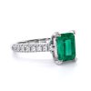 DA00743 Emerald_ with side stones_RR01_lay_side_white_emerald_Denoised_beauty