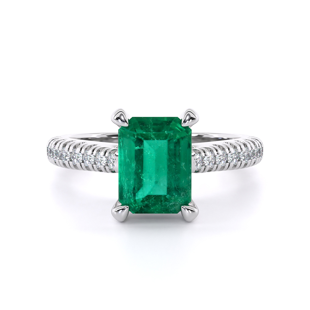 DA00743 Emeraldwith side stones_RR01_lay_front_white_Emerald_Denoised_beauty